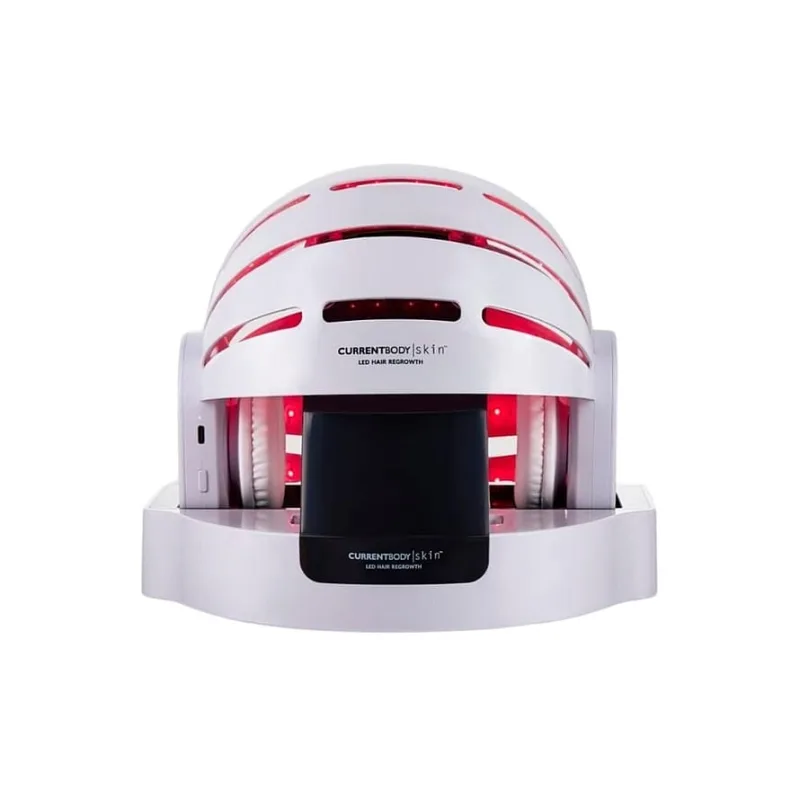 CurrentBody Skin LED Hair Regrowth, vit hjälm med röda lysdioder på sitt stativ